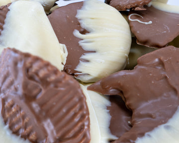 Milk chocolate and white chocolate cow chips