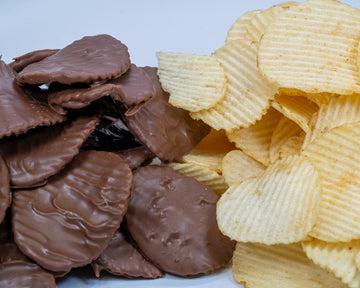 Chocolate covered potato chips close up