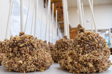 chocolate and caramel covered marshmallow rolled in pecans